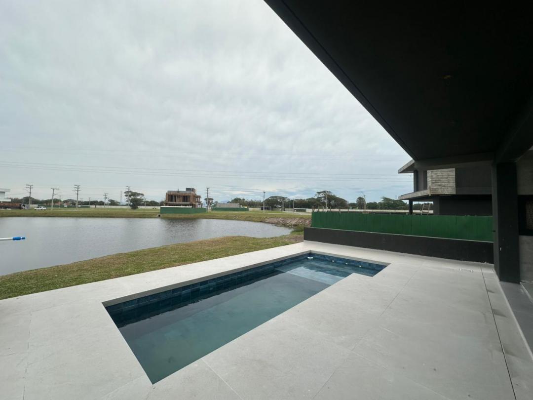 Foto de Casa · Allure Beach Condo