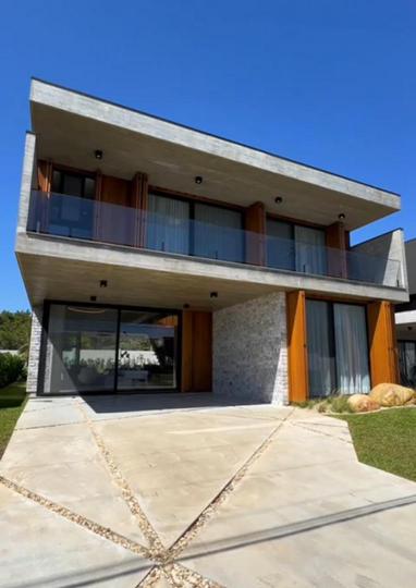 Casa em Condominio à venda no bairro Capão Novo, CAPÃO DA CANOA, Referencia: CAC111